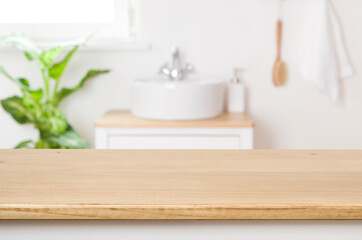 Blurred modern minimalistic bathroom with vessel sink in on countertop