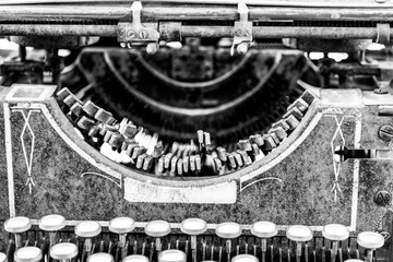 Old fashioned typewriter in black and white color