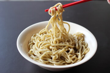 a bowl of plain noodle