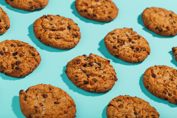 Oatmeal cookies on a blue background with a pattern in the form of a pattern.