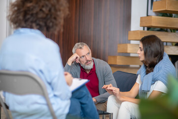 Man and woman visiting a family psychologist together