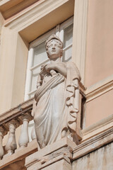 statue on buildings facade in Cagliari center (Bastion of Saint Remy).