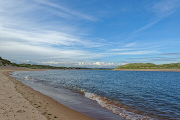 The Ythan Estuary in Aberdeenshire on the East Coast of Scotland, under a big Blue Sky on a September late afternoon with the tide coming in.