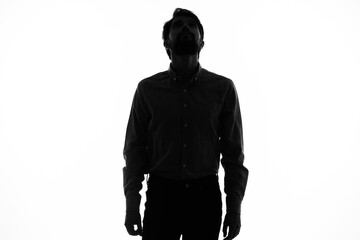 dark silhouette of a guy on a white background model cropped view close-up