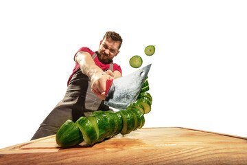 Amazing caucasian man preparing unbelievable food with action, details and bright emotions,...