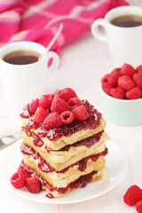Sandwiches with peanut butter and raspberry jam