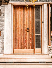 contemporary house main entrance natural wood door and side transom window