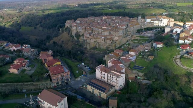 Aerial view of Farnese, A village in Viterbo, houses, roads and a landscape
