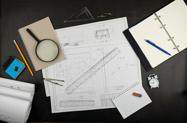 Sketching supplies. Work desk for architect, designer, engineer. Ruler pencil, notepad magnifying glass, eraser. Notebook with place for text. View from above. Sketches