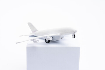 Miniature aeroplane isolated on white