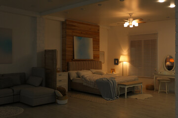 Stylish apartment interior with modern ceiling fan in evening
