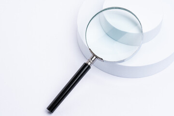 Magnifying glass on white background