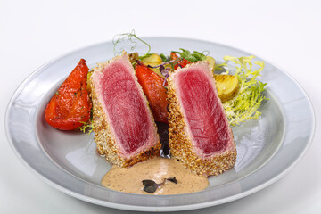 Tuna fish tataki in sesame seeds