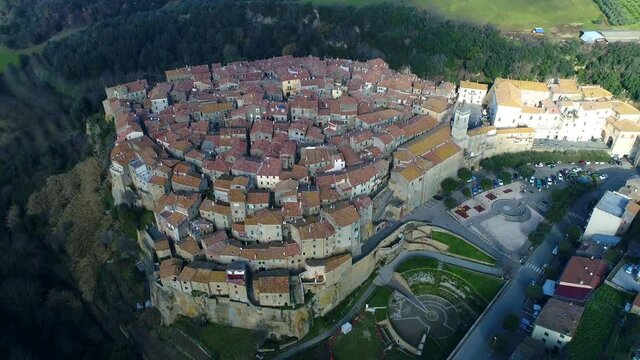 Aerial view of Farnese, A village in Viterbo, houses, roads and a landscape

