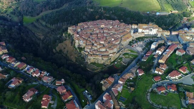 Aerial view of Farnese, A village in Viterbo, houses, roads and a landscape
