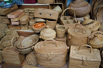 Balinese handmade rattan bags in a local souvenir market, Shops and Market on the Street in Ubud , Bali Island, Indonesia