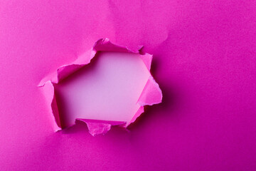 Ripped paper, space for copy. Vivid pink torn paper sheet.
