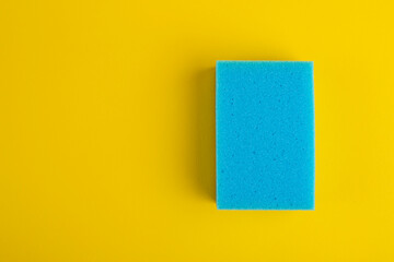 Kitchen washcloth on yellow background. Sponges. Washcloths for cleaning.