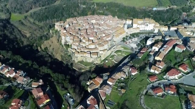 Aerial view of Farnese, A village in Viterbo, houses, roads and a landscape
