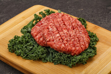 Raw beef burger cutlet for cooking