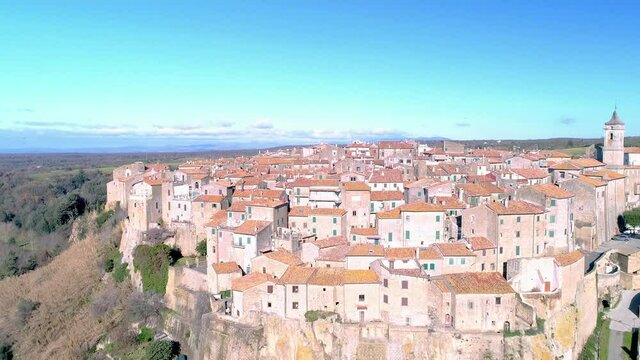 Aerial view of Farnese, A village in Viterbo, houses, roads and a landscape
