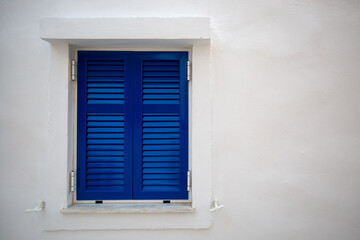 window with blue shutters, greece colors, 