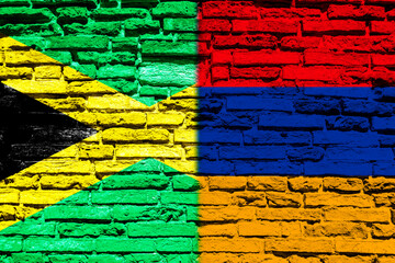 Flag of Jamaica and Armenia on brick wall