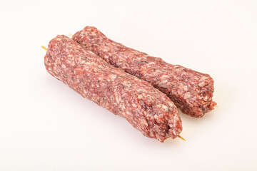 Raw minced beef kebab skewer