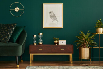 Luxury interior with stylish velvet sofa, wooden commode, mock up poster frame, plants, gold...