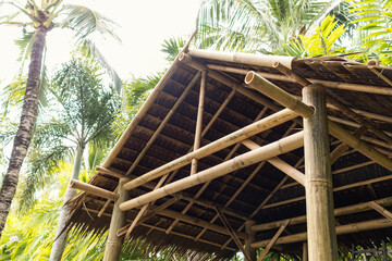 Bamboo constructed building details. Eco friendly natural bamboo hub structure in tropical island.
