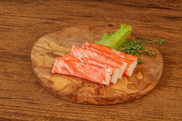 Crab sticks served salad leaves