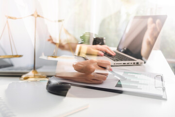 Business and lawyers discussing contract papers with brass scale on desk in office. Law, legal services, advice, justice and law concept picture with film grain effect