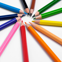 Multi-colored pencils on white background, palette of colors