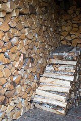 Birch woodpile in the countryside of various shapes and sizes