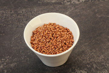 Raw buсkwheat cereal in the bowl
