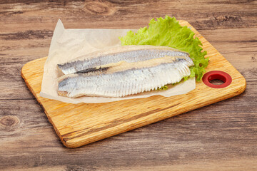 Herring fillet with salad leaves