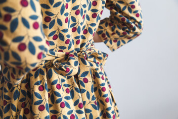 Belt vintage cotton warm dress close-up at the back