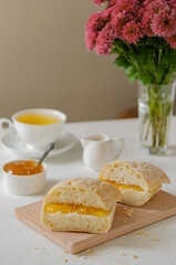 Sunny breakfast - toast with orange jam and tea.