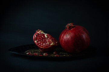 pomegranate on a black background