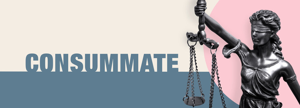 Consummate. Close-up of a Lady Justice statue. Law and lawyer symbol. Figure stands in front of paper with text.