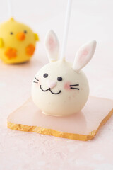 Delicious sweet cake pops on light background, closeup. Easter holiday.