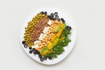 Food bowl with chickpeaks. Health dinner. Vegetarian cooking cuisine. Cafe organic meal. Fresh lunch with pumpkin and feta cheese. Detox spicy. Above view. Flatlay