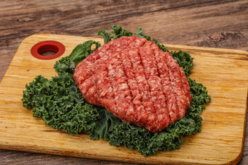 Raw beef burger cutlet for cooking
