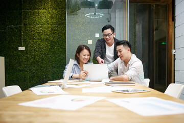 young asian entrepreneurs discussing business