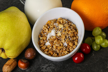 Breakfast with granola and milk