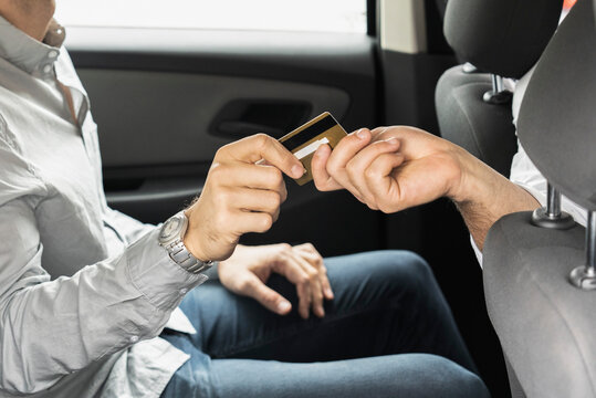 Young man making payment through credit card