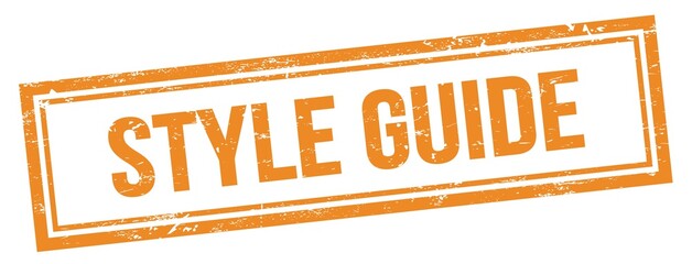 STYLE GUIDE text on orange grungy vintage stamp.