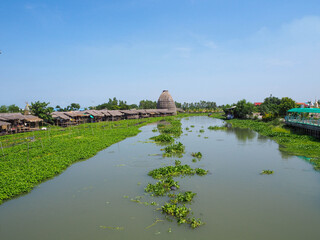 Fototapeta na wymiar The good view of Riverside community and floating market,Tha Chin River, Thailand