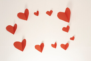 frame from paper hearts on white isolated background. valentine's day cards