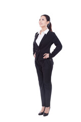 Portrait of a businesswoman standing in a suit 